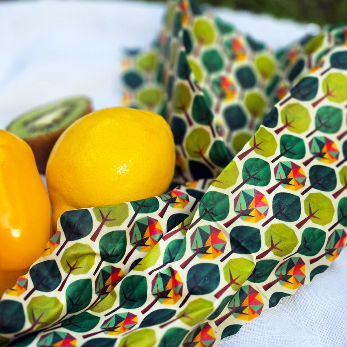 Bivaxdukar 3 pack med skogsträd tillsammans med citron och kiwi